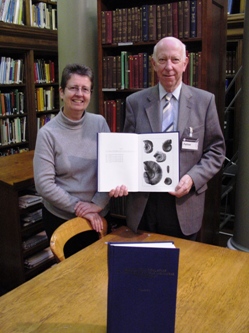 Prof. John C W Cope presents the Englished Uzbek volume to Sheila Meredith, Chief Librarian